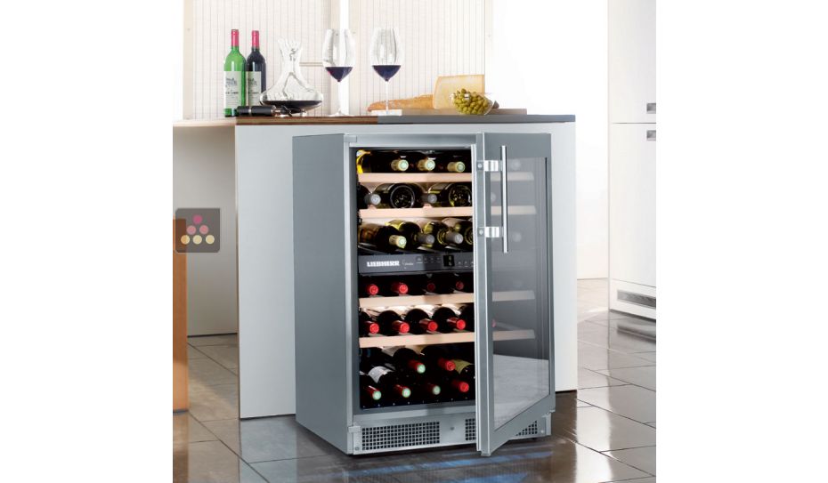 Dual temperature wine cabinet for storage and/or service
