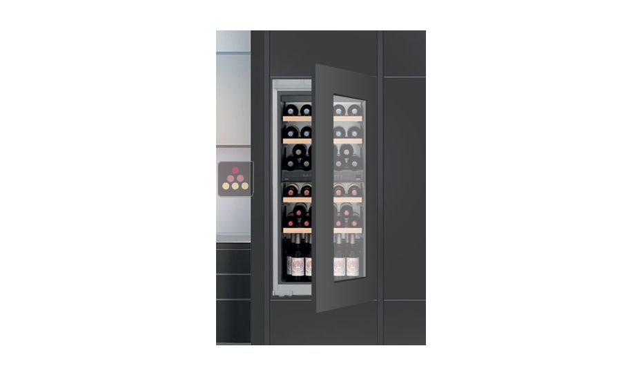 Multi-purpose built in wine cabinet for the storage and service of wine
