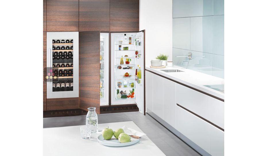 Multi-purpose built in wine cabinet for the storage and service of wine

