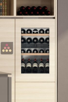Multi-purpose built in wine cabinet for the storage and service of wine

