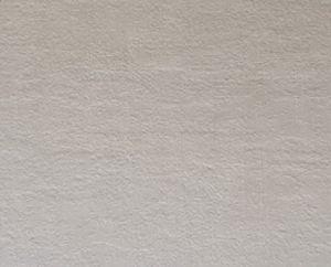 Cladding covered with a Dove-grey concrete finish laminate