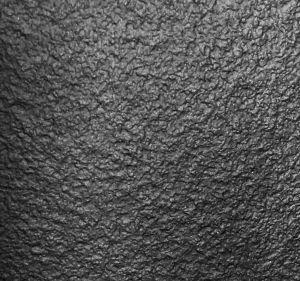 Wooden cladding covered with a textured Black finish laminate