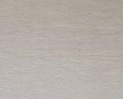 Cladding covered with a Dove-grey concrete finish laminate